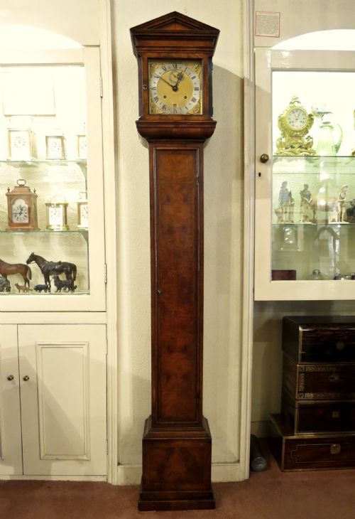 A Walnut "Grandmother" Clock of Highest Quality