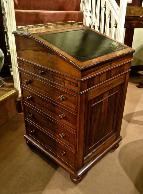Gillows: A Fine Rosewood Sliding-top Davenport