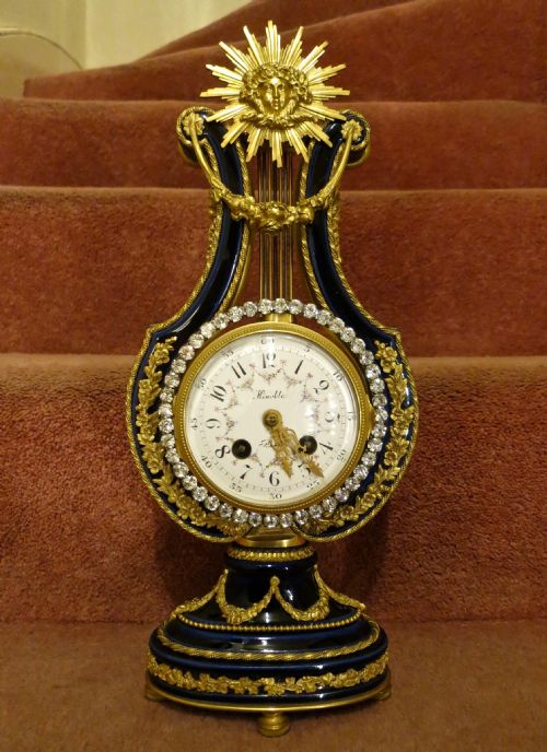 Highly Decorative French "Mystery" Mantel Clock