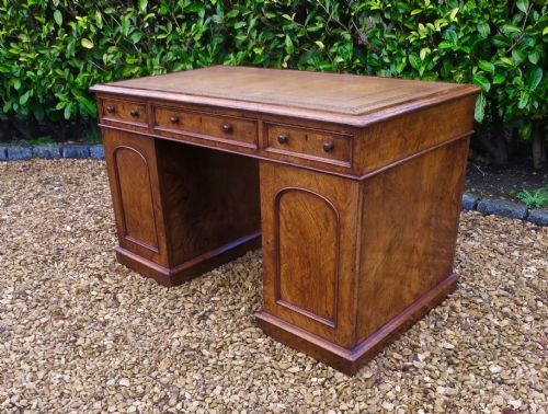 fig 1. MID VICTORIAN FIGURED WALNUT PEDESTAL DESK