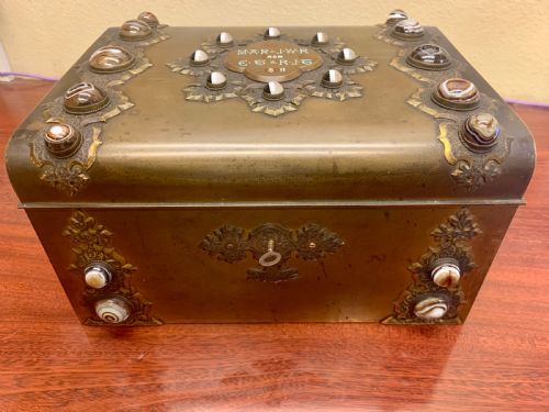 A Fine Quality Brass and Tiger Eye Games Compendium