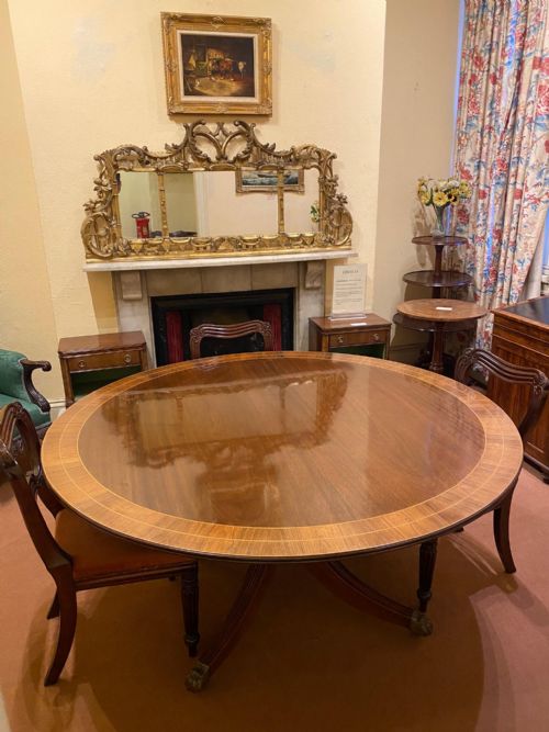 fig 1. A large high-quality circular mahogany tilt-top Dining Table