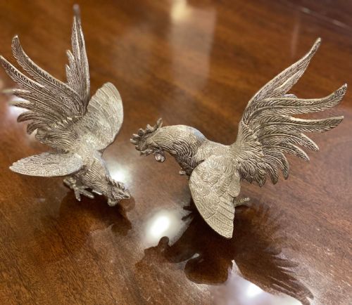 An Imposing Pair of Silver Plated Jousting Cockerels
