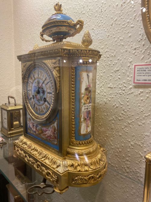 fig 2. 19th century Ormolu and painted-porcelain striking 8-day Mantel Clock