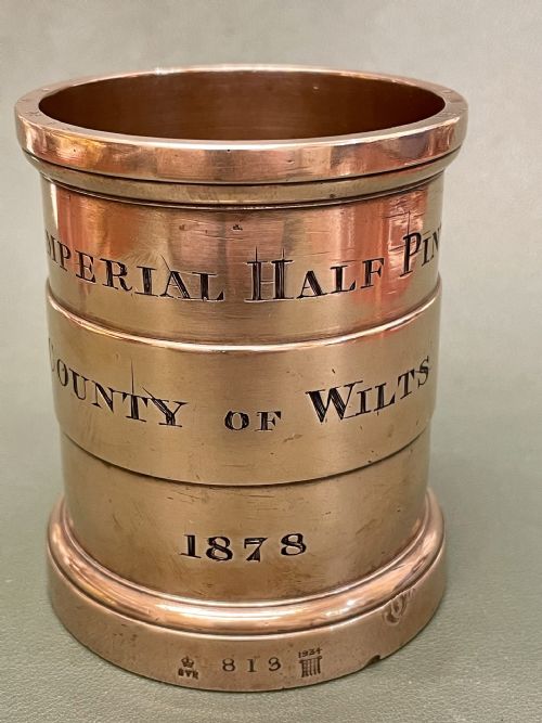 A Good Customs & Excise Imperial Half Pint Bronze Measure