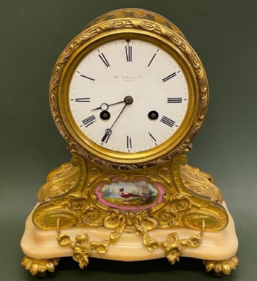 An Attractive French Ormolu and Porcelain-mounted Mantel Clock,