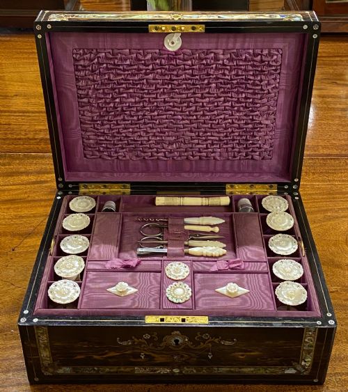 A Very Good Mid Victorian Coromandel-wood Sewing Box with Many Extras
