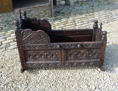 Fine Carved Oak Cradle Dated 1677