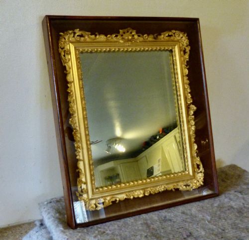 A Pretty Gilded Mirror in Rosewood Frame