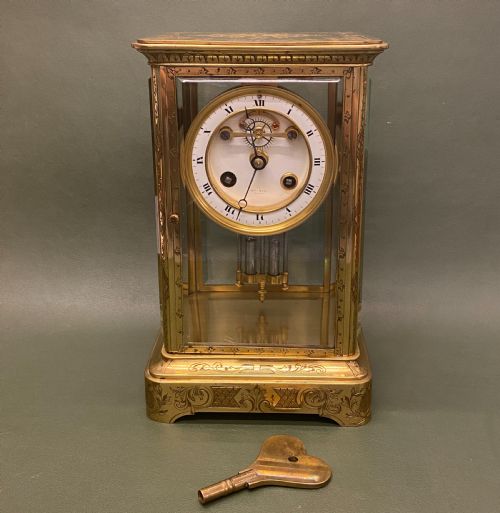 fig 1. A good French engraved brass 4-glass Mantel Clock with mercury weighted pendulum