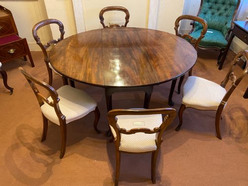 fig 1. A good Georgian oval mahogany drop-leaf dining table