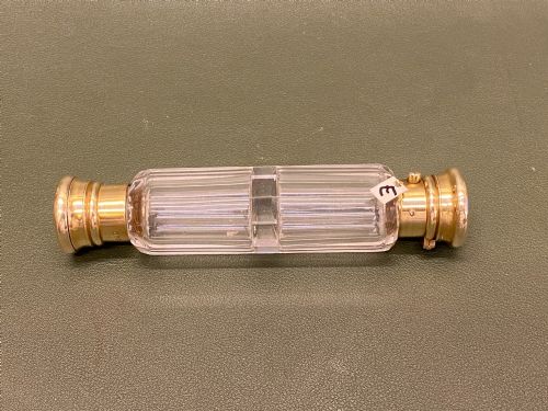 A Clear Glass Multi-facted Double Ended Scent Bottle/vinaigrette with Silver Gilt Tops