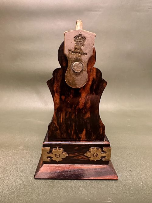 fig 1. Coromandel-wood 3-decanter Tantalus of smaller size, by Betjemann of London