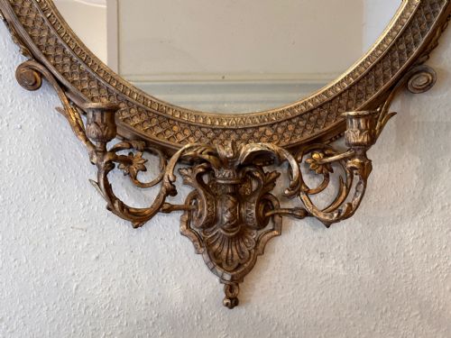 fig 1. Late 18th / Early 19th century carved gilt framed oval mirror