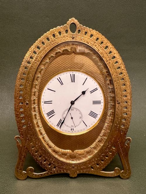 fig 1. A fine quality mid 19th century pierced gilded Clock in the manner of Thomas Cole