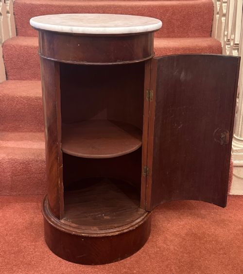 fig 1. Regency period flame-mahogany cylindrical bedside Cupboard