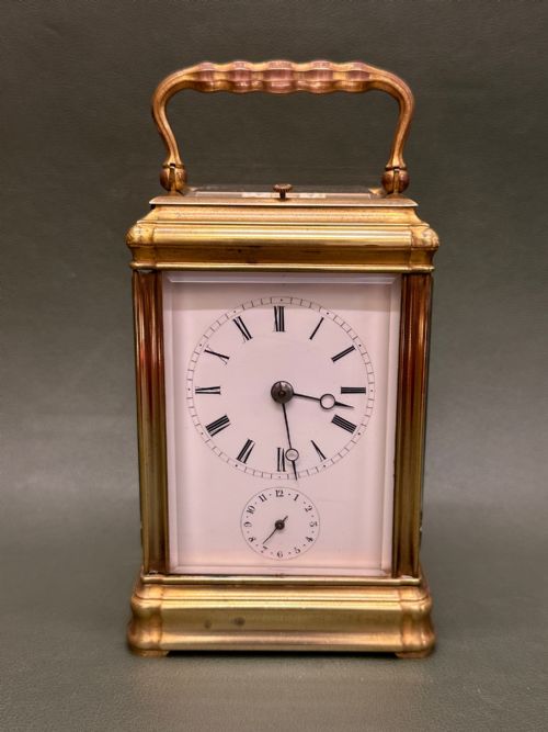 fig 2. French brass 8-day Carriage Clock with strike-repeat and Alarm in a Gorge case, c.1860.