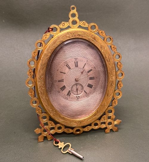 fig 1. Victorian Gilt Metal Strut Clock in the manner of Thomas Cole