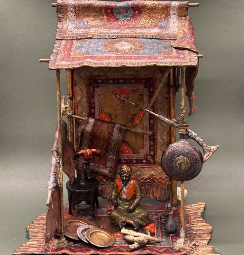 fig 1. Austrian Cold Painted bronze figural group of an Arab Rug Trader. Manner of Franz Bergmann