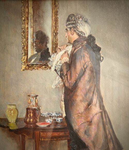 fig 1. An antique oil painting depicting an 18th-century gentleman admiring his reflection in a wall mirror, housed within a deep moulded black frame with a gilded inner slip.