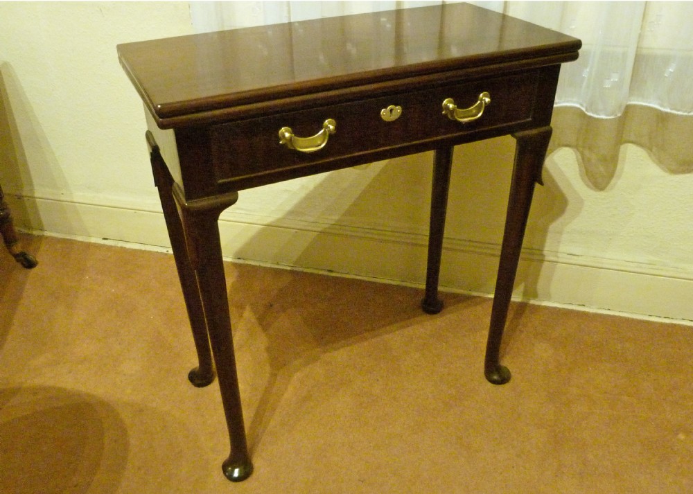 A SMALL GEORGE II SOLID CUBAN MAHOGANY TEA TABLE