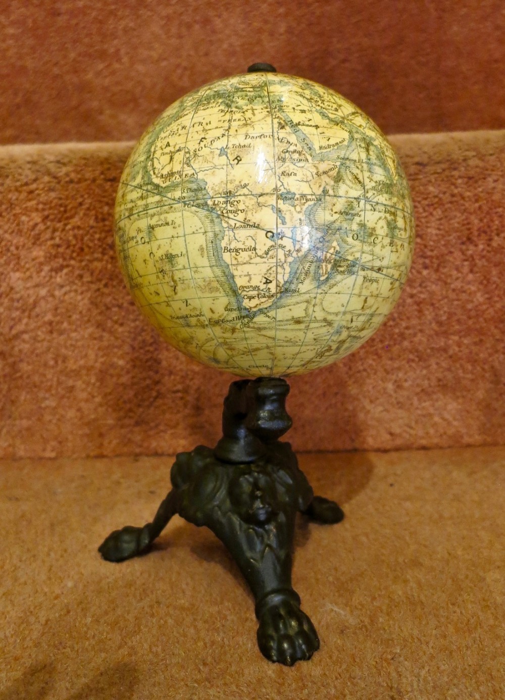 A CHARMING TERRESTRIAL GLOBE ON STAND