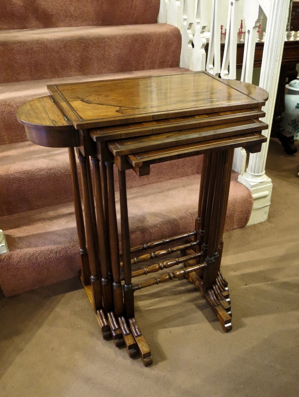 FINE NEST OF FOUR ROSEWOOD TABLES