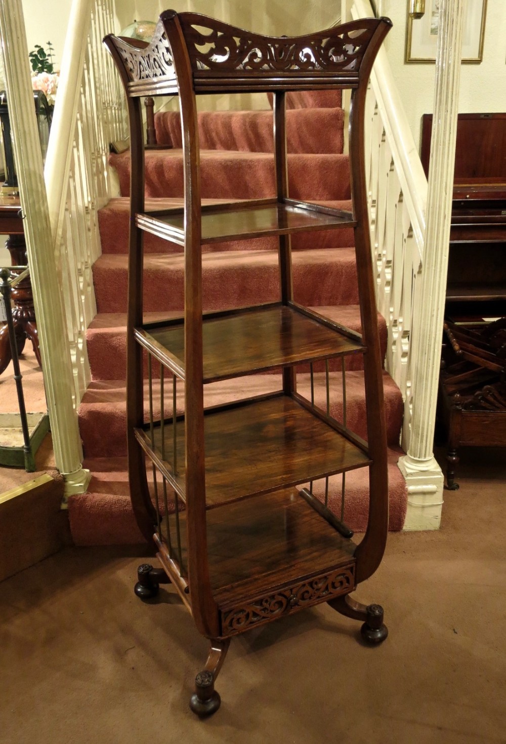 A REMARKABLE REGENCY ROSEWOOD WHATNOT 