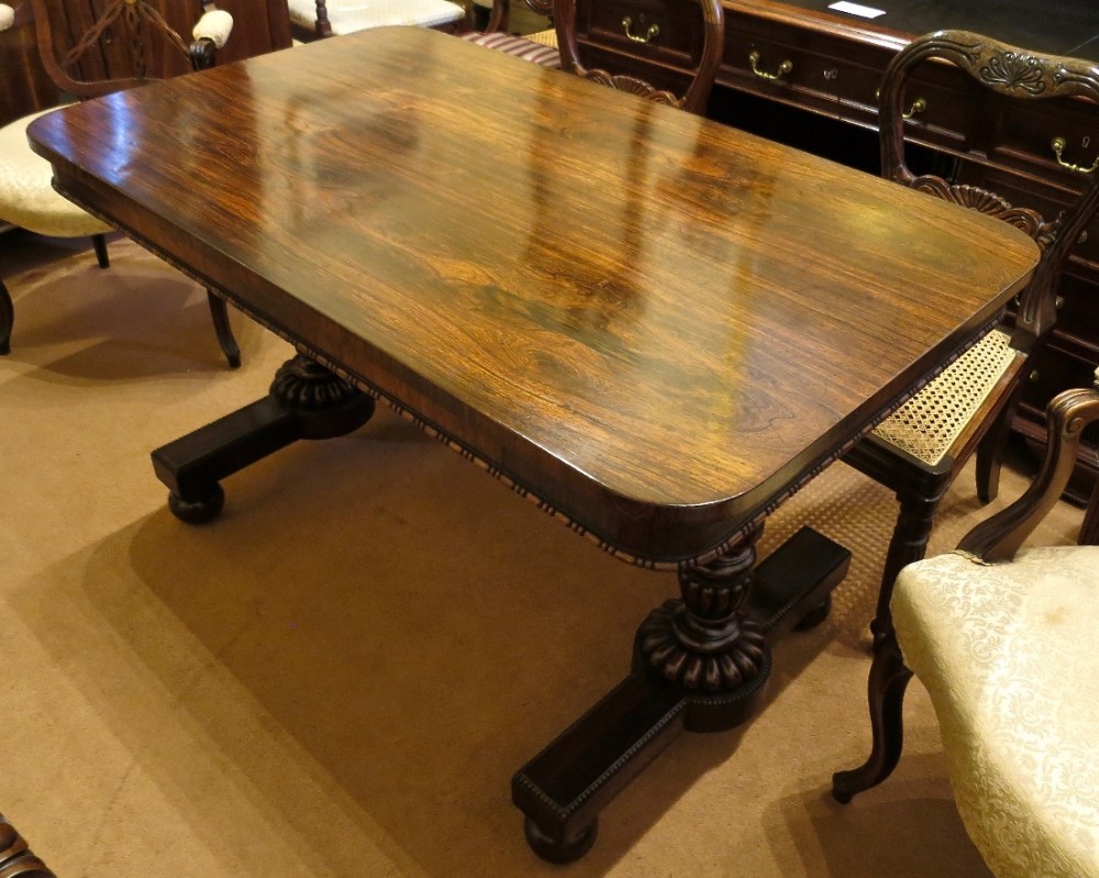 GILLOWS OF LANCASTER: A ROSEWOOD LIBRARY TABLE