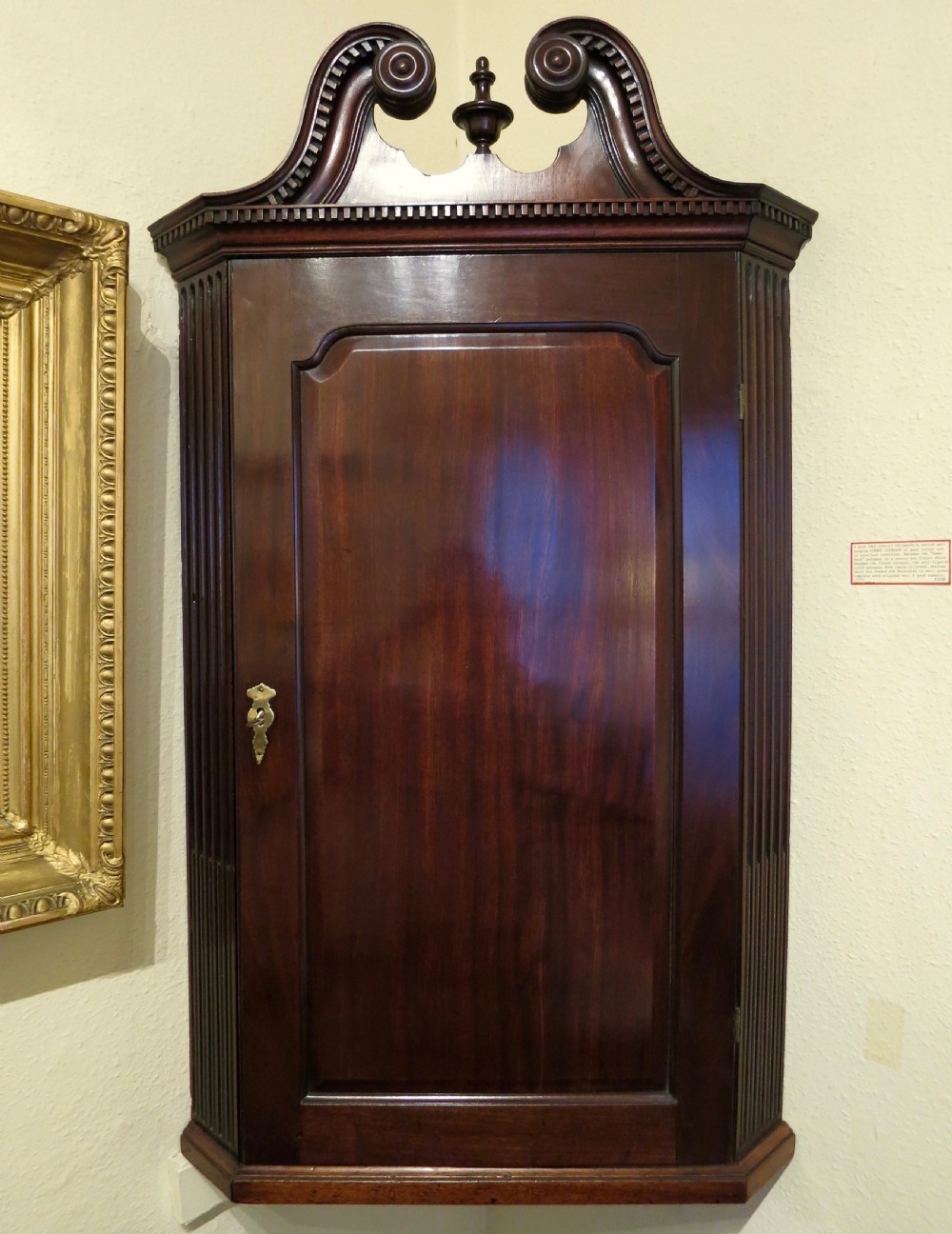 A CHIPPENDALE PERIOD CORNER CABINET View II