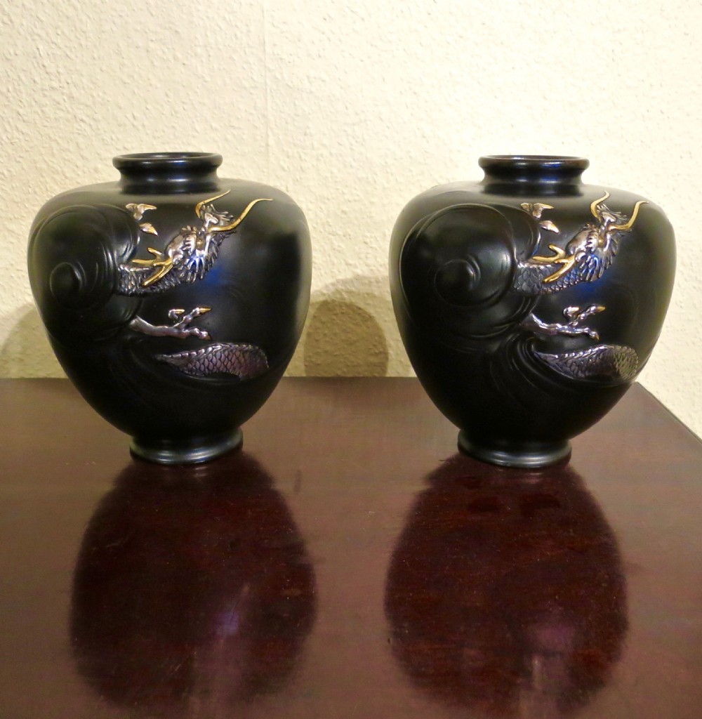 INTERESTING PAIR OF JAPANESE BRONZE VASES