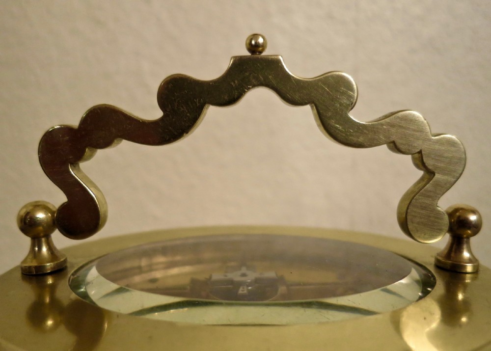 GOOD FRENCH OVAL STRIKING CARRIAGE CLOCK View II