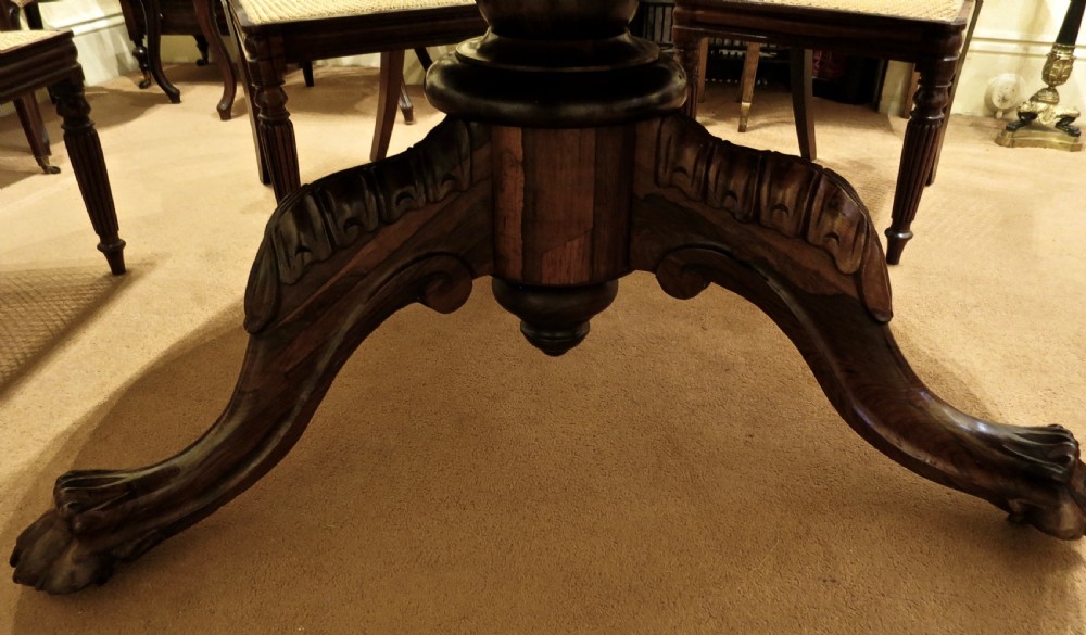 LARGE ROSEWOOD CIRCULAR DINING TABLE View IV