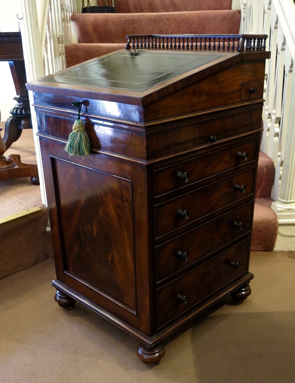 GILLOWS: MAHOGANY SLIDING TOP DAVENPORT 