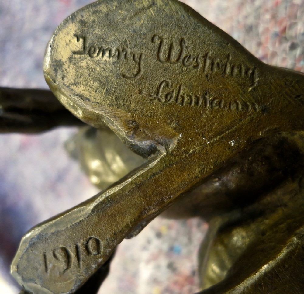 CHARMING BRONZE OF A PUPPY, DATED 1910 View V