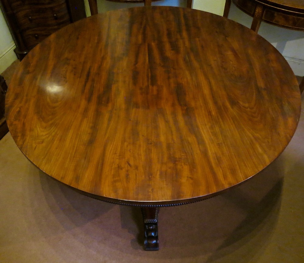 GILLOWS: A FINE CIRCULAR DINING TABLE View II