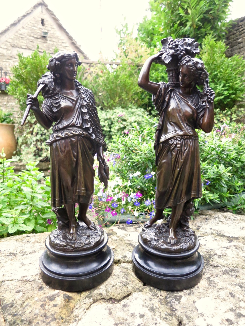 A CHARMING PAIR OF FRENCH BRONZE FIGURES