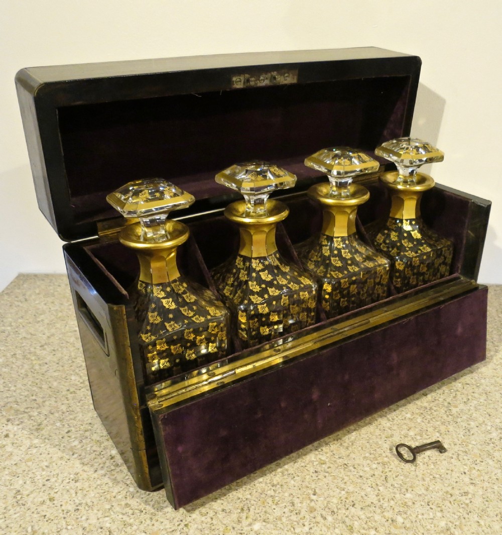 EXCEPTIONAL FOUR-DECANTER BOX