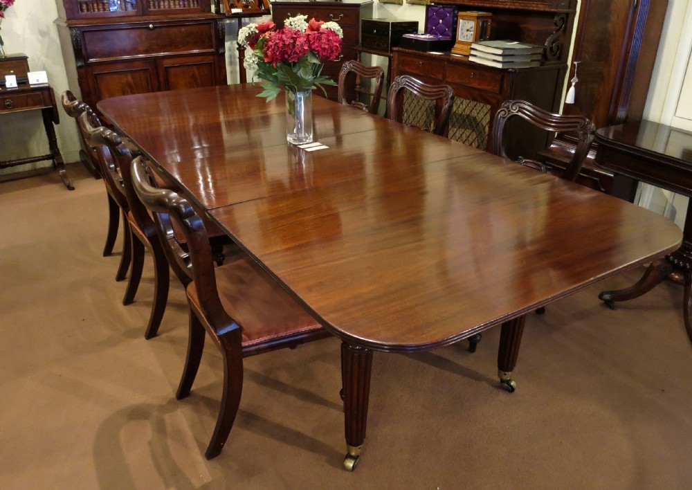 EXCEPTIONAL GEORGE III MAHOGANY DINING TABLE View II