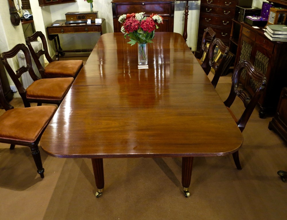 EXCEPTIONAL GEORGE III MAHOGANY DINING TABLE View III