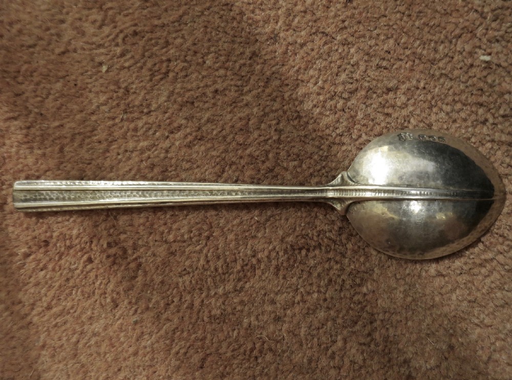 OMAR RAMSDEN: A FINE HAMMERED SILVER SPOON View II