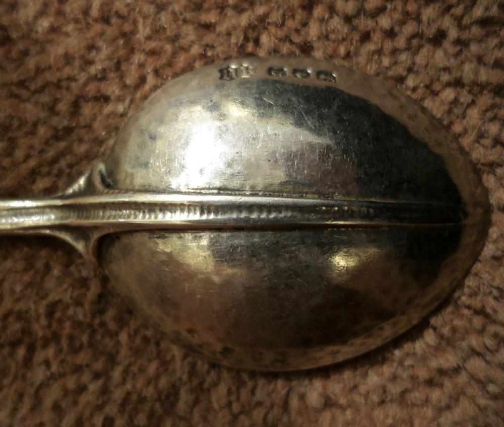OMAR RAMSDEN: A FINE HAMMERED SILVER SPOON View III
