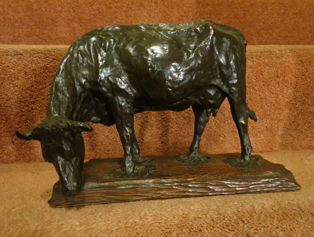 ANONYMOUS: A CHARMING BRONZE  SCULPTURE OF A COW!