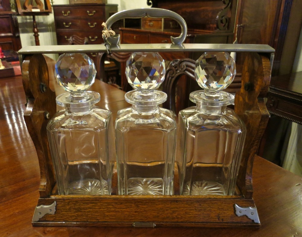LARGE 3-BOTTLE TANTALUS BY BETJEMANN View II