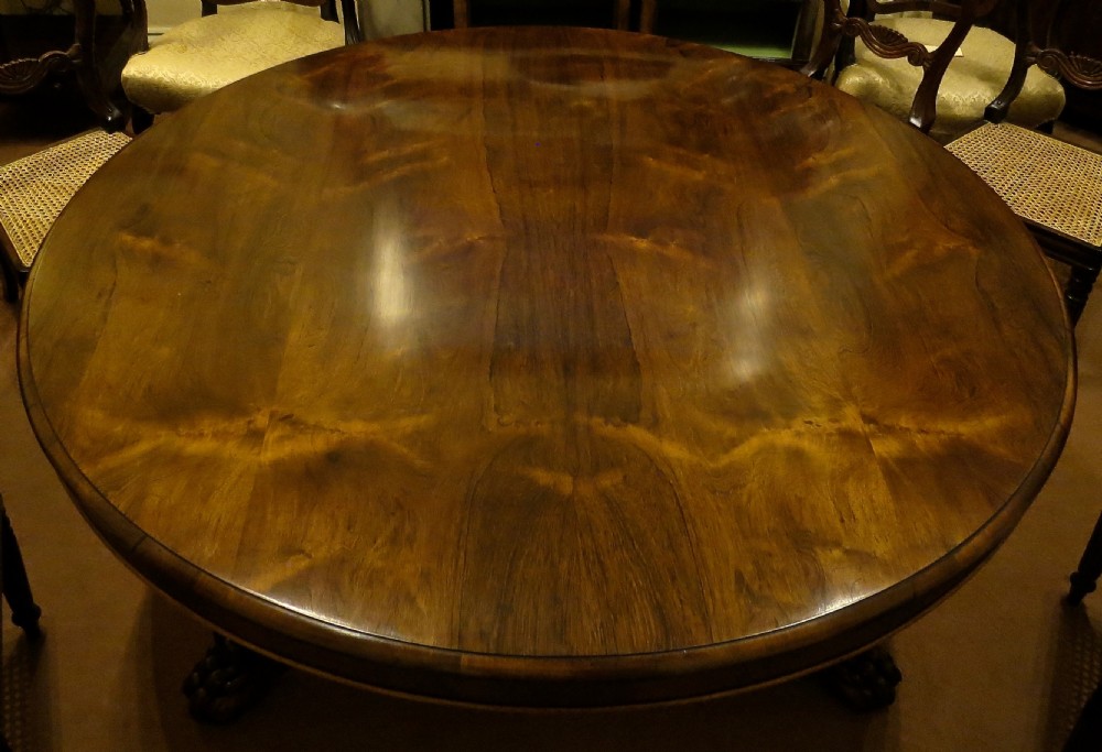 LARGE IMPRESSIVE CIRCULAR ROSEWOOD DINING TABLE
