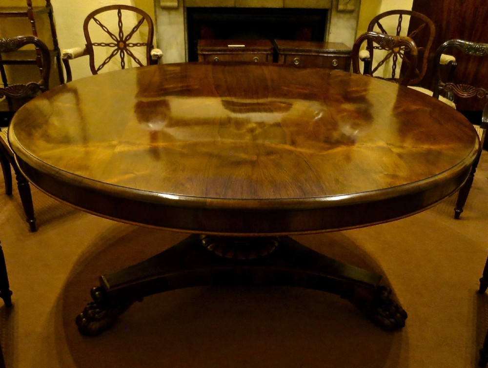 LARGE IMPRESSIVE CIRCULAR ROSEWOOD DINING TABLE View II