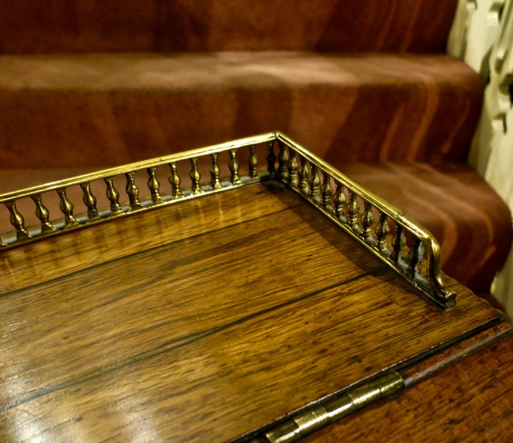 GILLOWS: A FINE ROSEWOOD SLIDING-TOP DAVENPORT View II