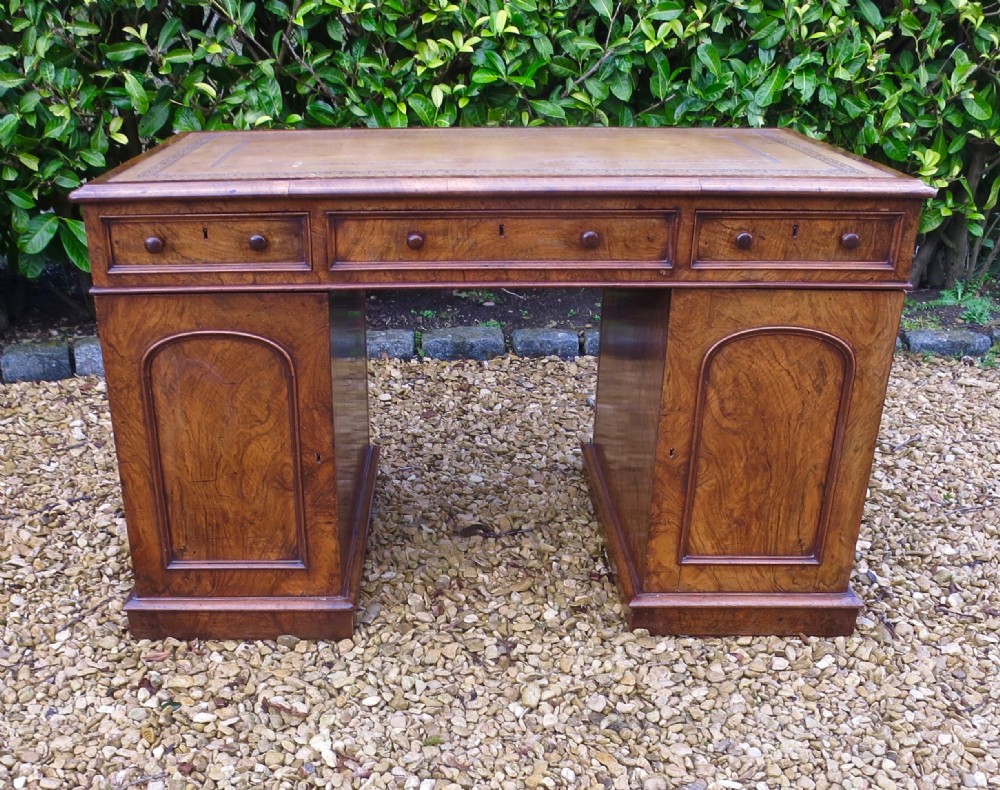 MID VICTORIAN FIGURED WALNUT PEDESTAL DESK