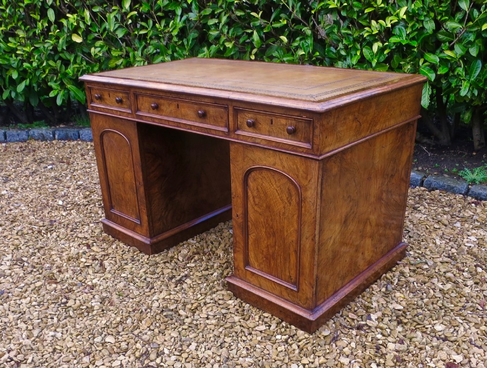 MID VICTORIAN FIGURED WALNUT PEDESTAL DESK View II