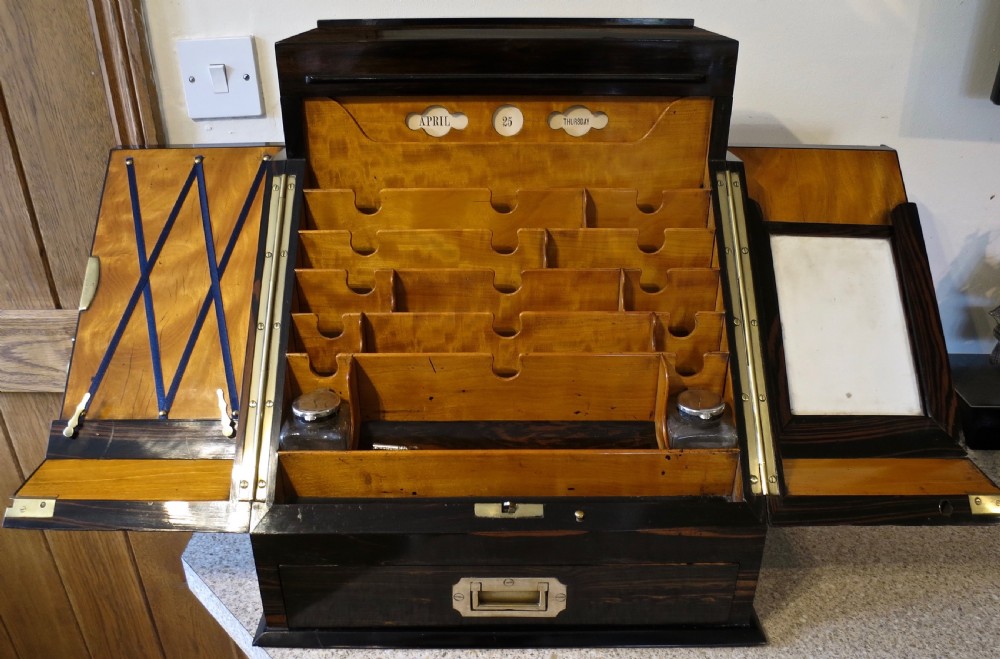 AN EXCEPTIONAL COROMANDEL FITTED STATIONERY CABINET